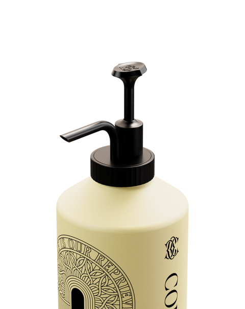 A bottle of Seymour Hair Conditioner with a reusable pump