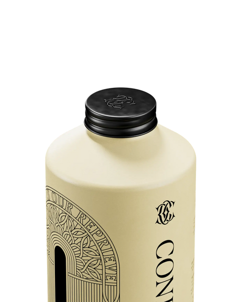 Bottle of Commune's Hair Conditioner Replenishment 