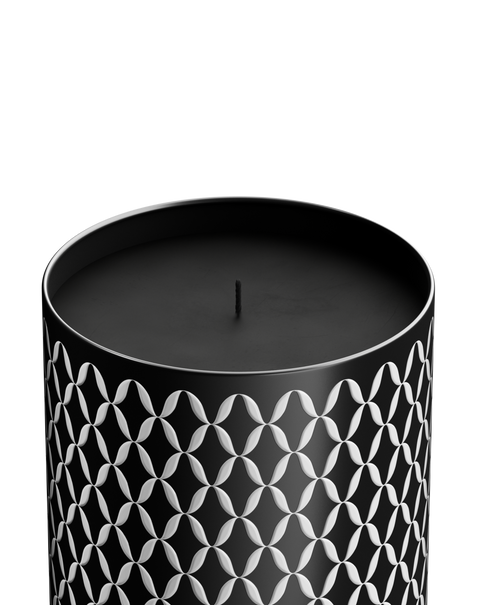 Nymphea Nox candle in an aluminum vessel with a geometric pattern, with a black marble lid.