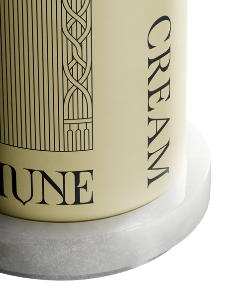 A circular white onyx triple tray with a product label in the center.