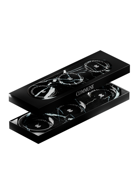 A black and white marble triple tray in a box