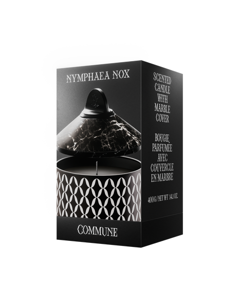 Nymphea Nox candle in an aluminum vessel with a geometric pattern, with a black marble lid.