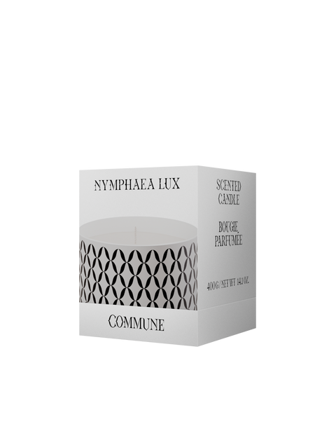 A Nymphea Lux candle with a geometric pattern printed on it.