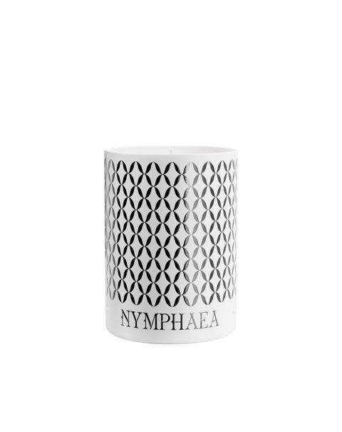 A Nymphea Lux candle with a geometric pattern printed on it.