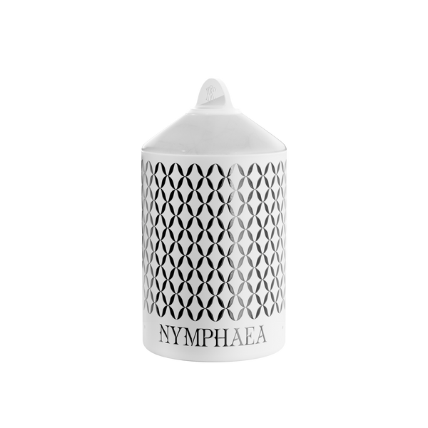A white Nymphea Lux candle with a geometric pattern, in an aluminum container with a white onyx lid in a box.