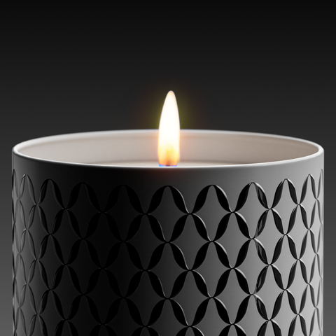 A white Osmanthus Lux candle with a geometric pattern, in an aluminum container with a white onyx  lid.