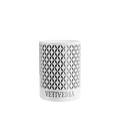 A luxury scented Vetiveria Nox candle with a geometric pattern on the aluminum vessel.