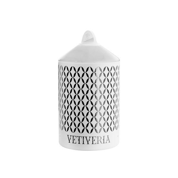 A luxury scented Vetiveria Now candle with a white onyx lid housed in a white aluminum vessel.