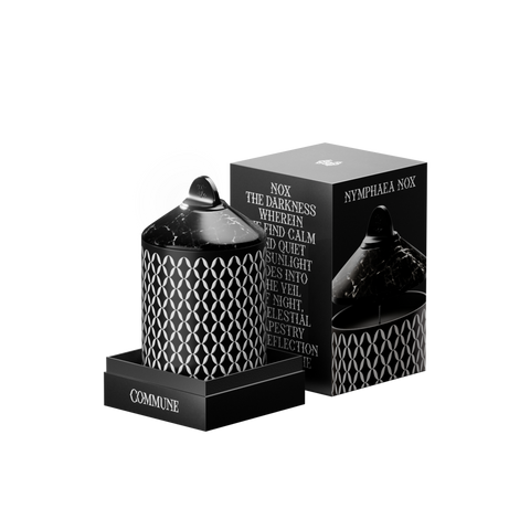 Nymphea Nox candle in an aluminum vessel with a geometric pattern, with a black marble lid.