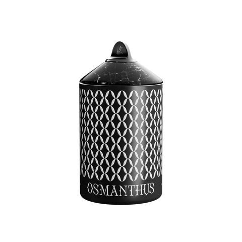A scented Osmanthus Nox candle with a black marble lid.
