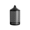 A luxury Vetiveria scented candle with a black and white geometric patterned cover.